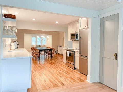 View of kitchen from mudroom. Pantry on the right.