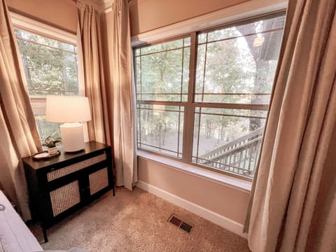 Master bedroom has a beautiful view of the lake