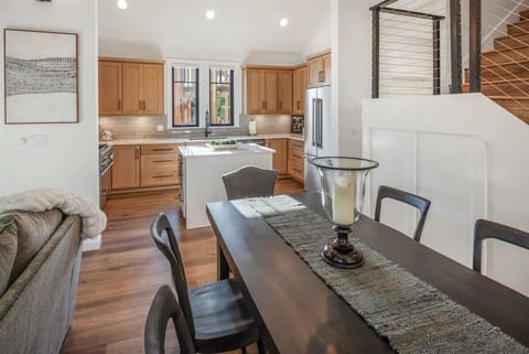 Gather round the dining table for eats and drinks or a board game