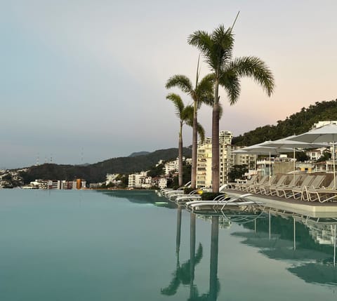 Bask in the afternoon sun from you poolside lounger