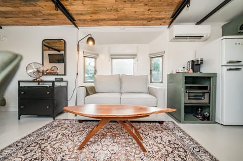 Loveseat is a pullout twin sleeper sofa (allowing 3 to sleep)