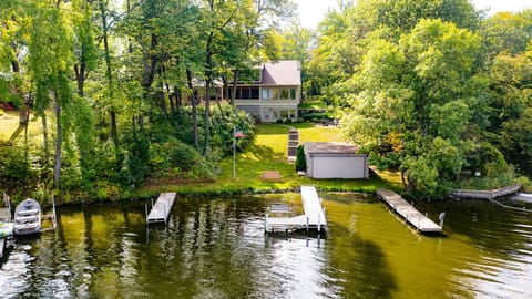 Level lakeshore with 3 docks for tieing up water craft.  Access to boat house.