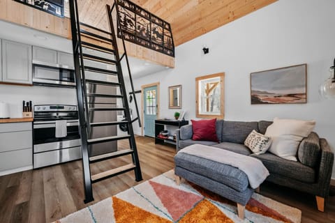 Main living area with view of the loft