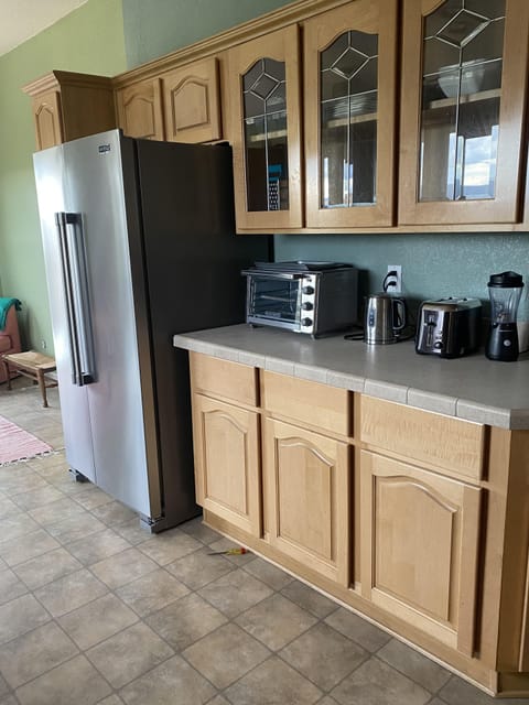 large fridge, air fryer, coffee maker, personal blender, toaster, kettle