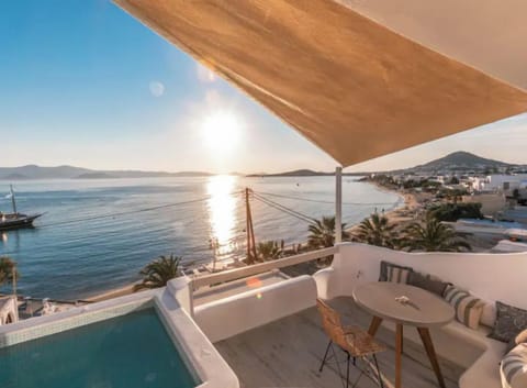 Sea view from the studio's balcony with a table