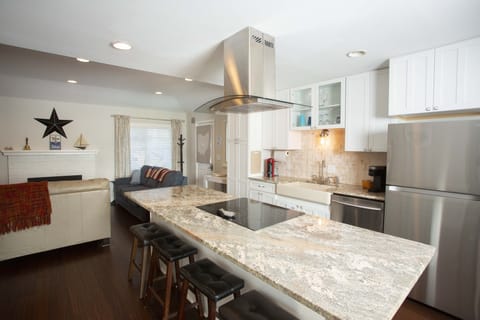 Large kitchen island with barstools.