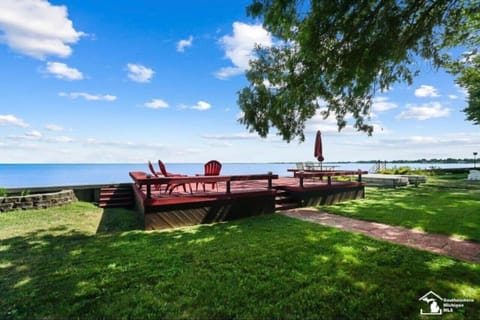 Welcome to your deck right on the Great Lake Erie! It's just outside of your very own Log Cabin cottage house! This original 100 year old Log Cabin was just newly restored to its original 1920's luster!