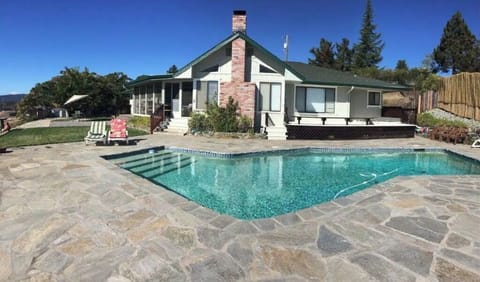 Pool and Hot tub. (Hot tub is on the deck to the right)