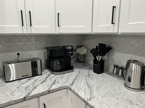 Brand new Keurig coffee maker, kettle and toaster. 