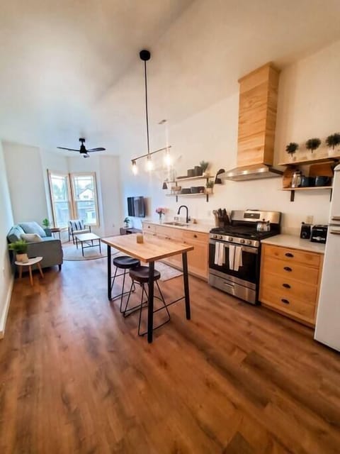 Open concept kitchen/living room with Main Street views (2)