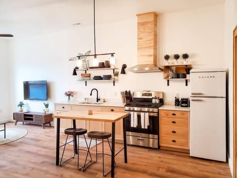 Fully stocked kitchen with gas range and full-size appliances