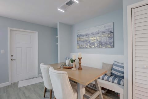 The Dining Space Has a Built In Bench and 2 Additional Chairs