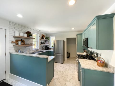 Fully equipped kitchen with stainless appliances