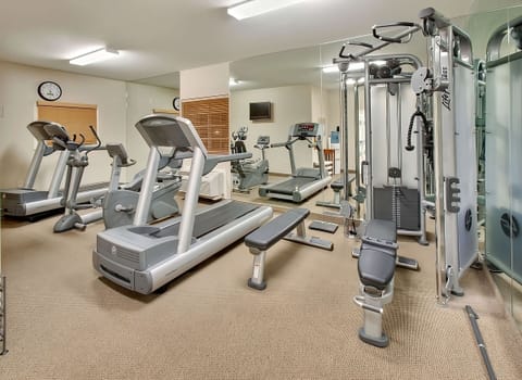 Recharge with a full workout in the bright, mirrored gym.