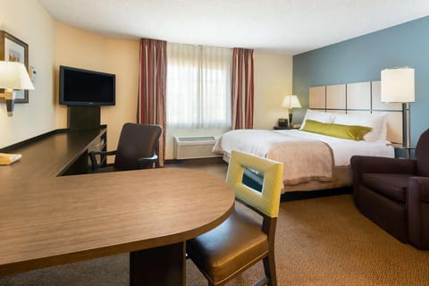 Unwind in a bright, spacious room with cozy seating.