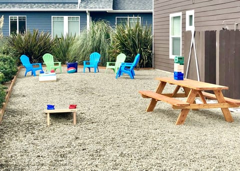 Corn-hole, outdoor games, Adirondack chairs, crab pots, & sand toys for your use