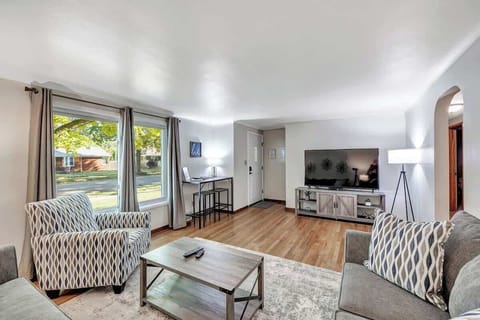 Living room with large-screen TV and seating area for 6 to 8 people