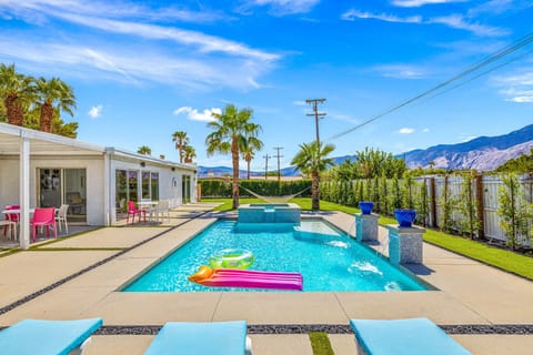Enjoy beautiful desert mountain views from this luxury heated pool or hot tub
