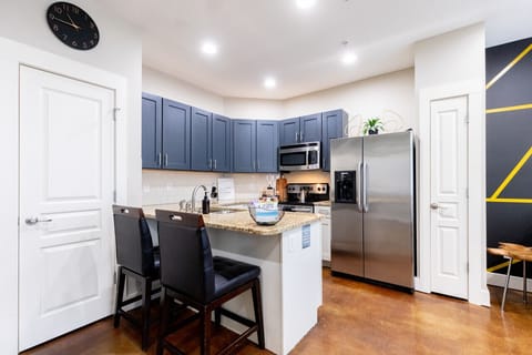 Fully Stocked Kitchen with Seating Options