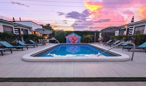Our new Pier Walk pool house mural in progress... artist Dreamweaver at work on May 3rd 2023.