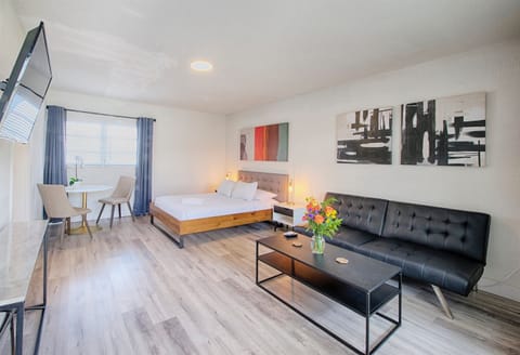 Welcome to your studio at Pier Walk! Plush dining chair and love seat futon provides multiple seating options