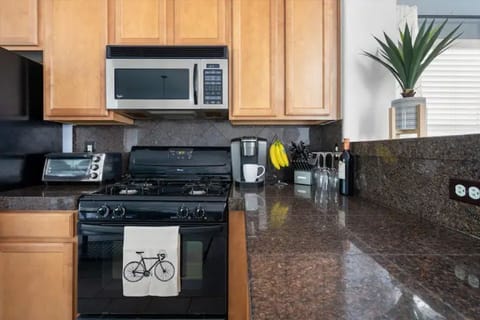 Enjoy coffee from the Keurig and use the microwave, stove, and toaster oven.