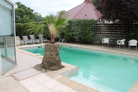 Lounge by the pool in the sunshine and take a dip in the outdoor pool.