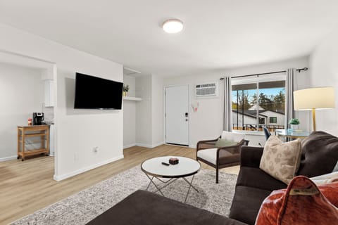 Beautifully Decorated Living Room with 55" Smart TV with Your Favorite Apps