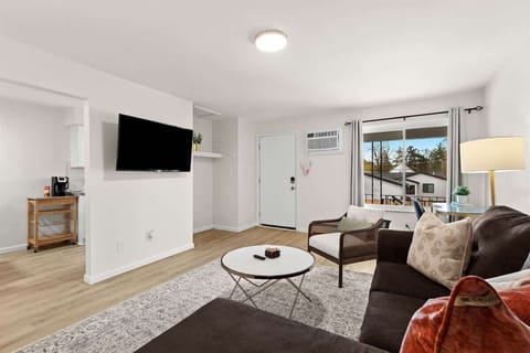 Beautifully Decorated Living Room with 55" Smart TV with Your Favorite Apps