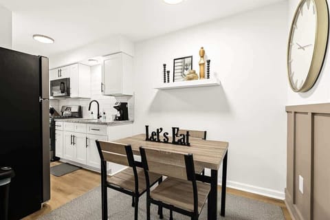 This spacious and bright dining room is the perfect place to enjoy a meal with friends and family.