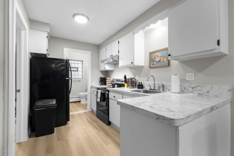 A kitchen that is both functional and stylish, perfect for any home cook.