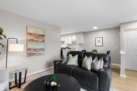 Modern comfort meets cozy charm in this inviting living area.