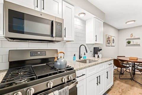 Fully equipped kitchen includes Microwave, Stove and coffee station