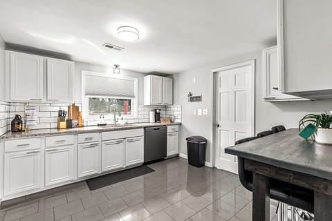 Serve your delicious meals easily at the lovely kitchen dining area.