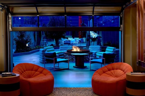 Gather by the glowing firepit for relaxed evening conversations.