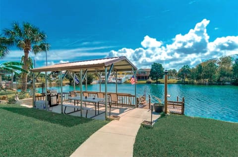 Waterfront pavilion & dock — perfect for grilling, relaxing, and sunset views