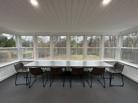 Dining table that seats 11+ with great views of passing wildlife and the lake