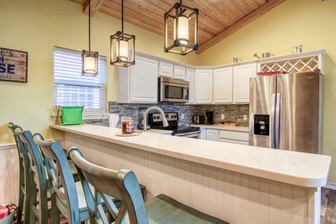 Pull up a seat at the breakfast bar and enjoy a cup of coffee or a glass of wine.