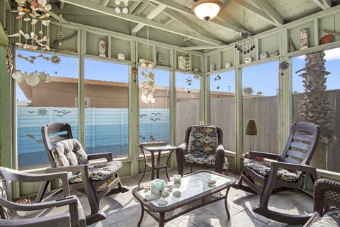 Savor the Sunroom - Can't decide if you want to relax outside or indoors? The sunroom is the perfect compromise!