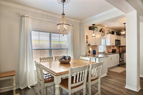 The beautiful dining table is the perfect place to gather your guests for an extravagant meal.