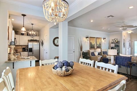 With the dining table conveniently located next to all of the action, it's easy to stay engaged with friends and family while grabbing a quick bite to eat.