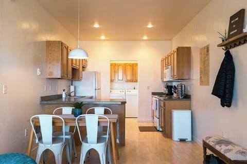 Adjoining dining and kitchen areas make family time more possible