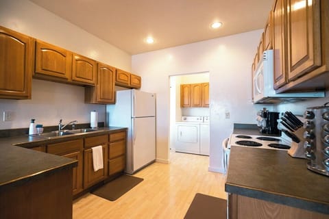 Cooking is practicable in our complete kitchen and there is also a dishwasher for easy cleanup