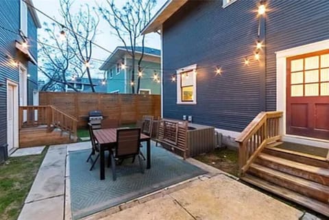 Shared backyard entry to the second story flat. 