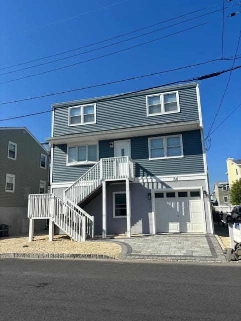You will be in the Upper Floor Unit Entrance is at the back of the house