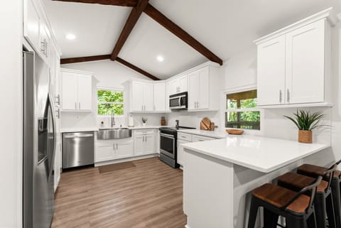 Enjoy cooking gourmet meals in the kitchen - well-stocked with everything you need. Granite countertops and stainless steel appliances.