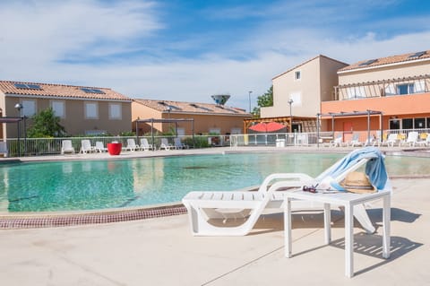 Dive into the gorgeous outdoor pool on a hot summer day.