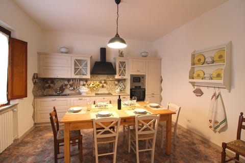 Table, Furniture, Property, Picture Frame, Chair, Wood, Interior Design, Building, Floor, Window