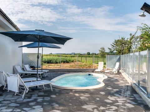 Water, Sky, Cloud, Azure, Swimming Pool, Shade, Outdoor Furniture, Leisure, Plant, Sunlounger