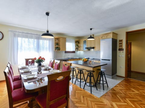 Furniture, Table, Chair, Countertop, Window, Wood, Kitchen, Interior Design, Clock, Flooring